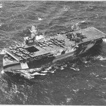 widest of aircraft carrier with multiple aircraft