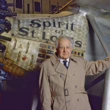 Man standing in front of aircraft