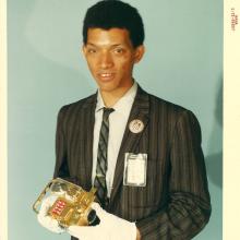 Portrait of Carruthers holding film transport. 