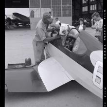 man works on aircraft