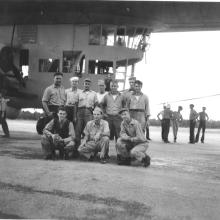 group of men pose in front of k-type airship