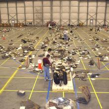 The largest pieces of Columbia’s wreckage were laid out on a grid on the floor of the reconstruction hangar.