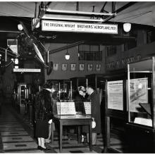 Visitors look at exhibit