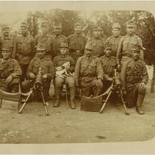 Two rows of men in military uniform