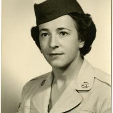 Formal studio portrait of Helen G. James, in uniform.