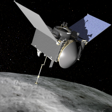 Illustration of the OSIRIS-REx spacecraft orbiting the asteroid Bennu. 