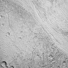 A photo taken by NASA's Cassini spacecraft of the surface of Enceladus.