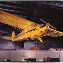 Yellow aircraft hanging