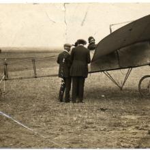 Men gathered around aircraft