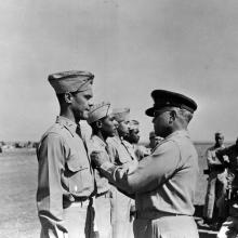 Benjamin O. Davis Sr. pins Distinguished Flying Cross on Davis Jr.