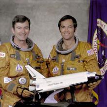 Astronauts John W. Young (left), commander, and Robert L. Crippen, pilot, part of the first STS-1 program. 