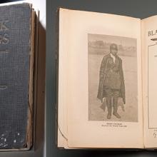 The front cover and inside flap of the Museum’s copy of Black Wings.