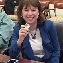 Dr. Margaret Weitekamp holding a dilithium crystal