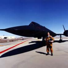 Phil Soucy stands in front of the SR-71