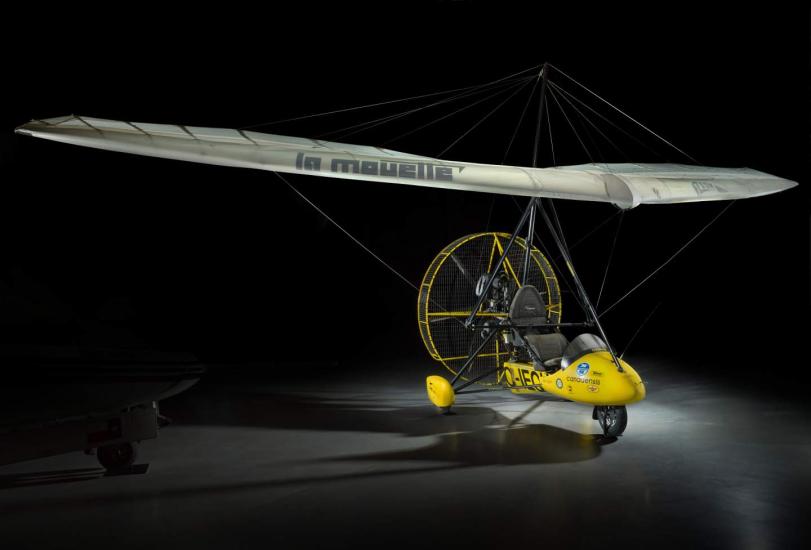  Yellow painted French two-seat flying wing ultralight inside the museum. 