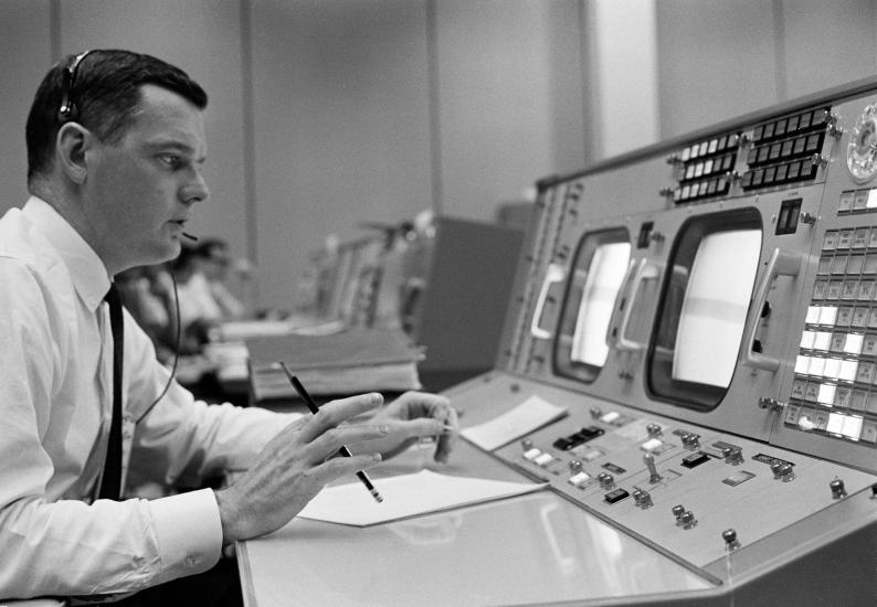 Man sitting at a flight control station