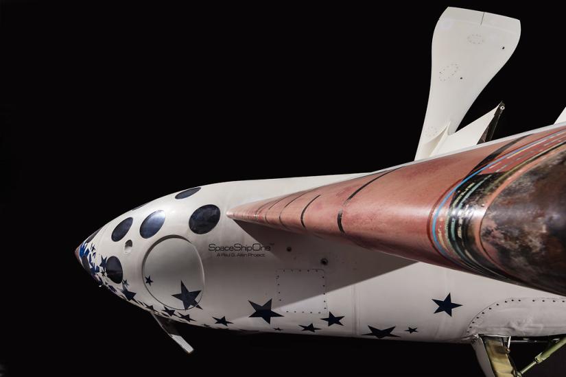 Profile view of SpaceShipOne against black background.