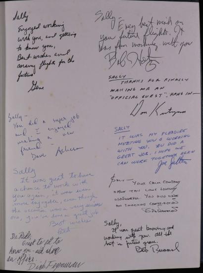 A page filled with signatures and notes, similar to a yearbook page. 