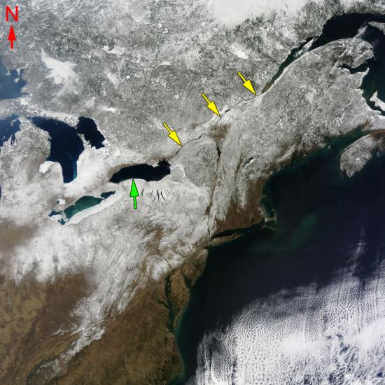 Satellite image of a long river crossing snowy land.