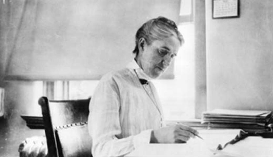 Portrait of Henrietta Swan Leavitt at work in the Harvard College Observatory