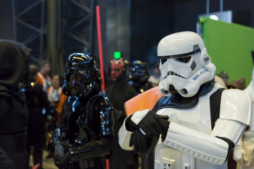 Costumed people dressed as Stormtroopers,  Darth Vader, and Darth Maul stand at our Air and Scare event in the Steven F. Udvar-Hazy Center.