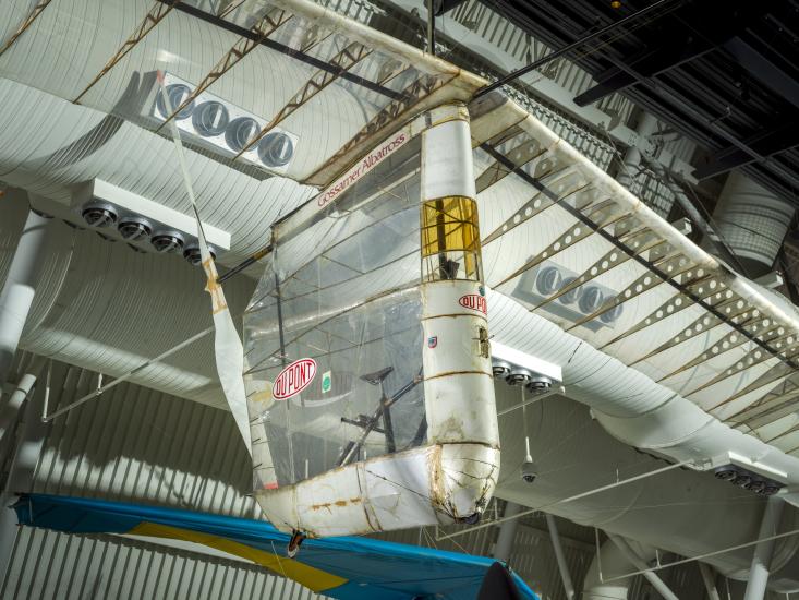 Close up image of an aircraft hanging in a gallery 