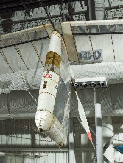 Image of an aircraft hanging in a gallery 