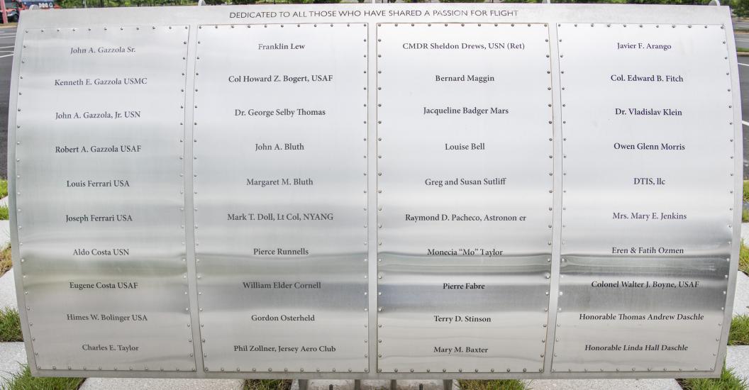 Metal plaque listing Wall of Honor Honorees