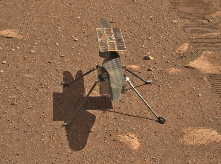 Close-up image of the Ingenuity Mars Helicopter on the surface of Mars.