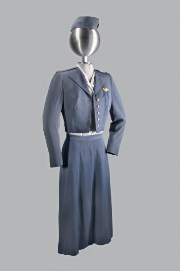 A photograph of a blue-gray uniform on a mannequin. 