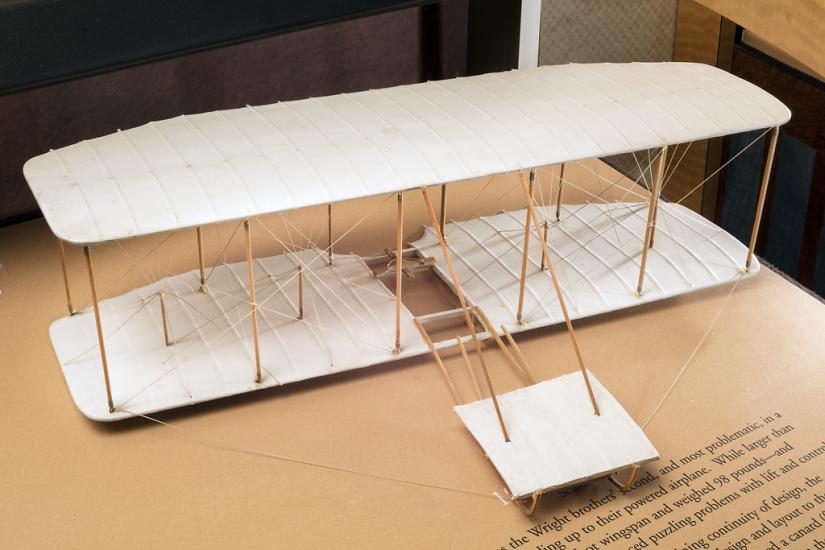 Wood and tissue exhibit model of the 1901 Wright glider in overall natural color scheme. 1/16 scale.