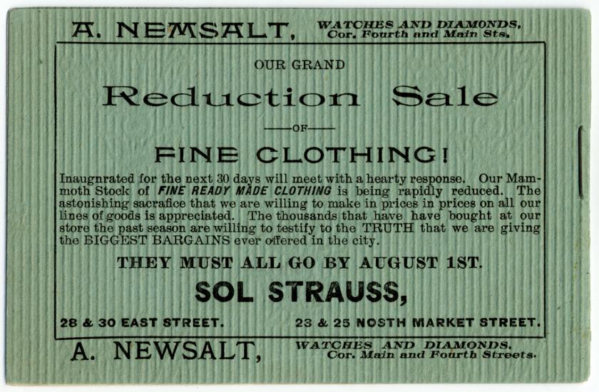 A green paper printed with Reduction Sale - Fine Clothing.