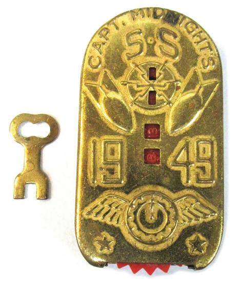 Few promotional items were more coveted than the Captain Midnight decoder badge, such as this gold-colored one from 1949, which needed to be unlocked with an accompanying key.