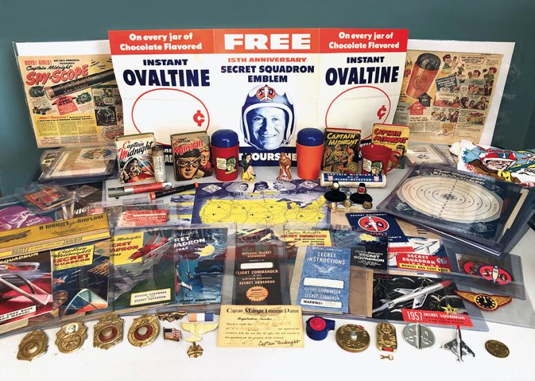 Jon Gothold’s collection of more than 100 Captain Midnight items—including pins, cups, posters, decals, and badges—is a delightful sampling of the vast number of premiums issued during the Golden Age of Radio.