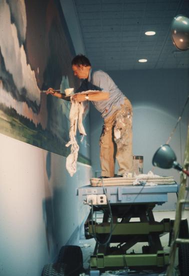 Eric Sloane paints the Weather Mural at the National Air and Space Museum