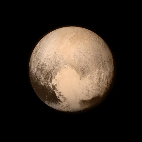 An image of Pluto with a large heart shape on it in the bottom right.