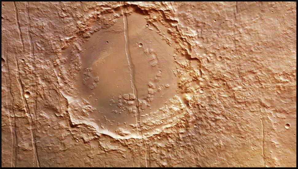 A large circular shape on the surface of Mars that appears smoother than the ground around it.