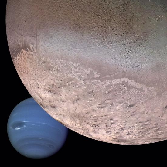 Triton takes up the top right corner of the frame, extending almost its entirety. Neptune can be seen behind Triton in the bottom left.