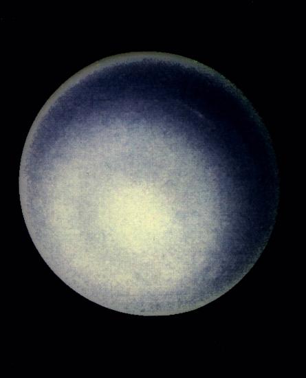 A hazy blueish orb against a dark background.