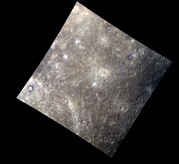 An image of Mercury's surface featuring difference shades of browns and grays.