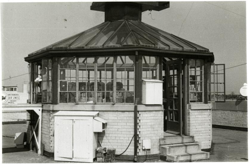 Black and white photo of glass enclosed control tower