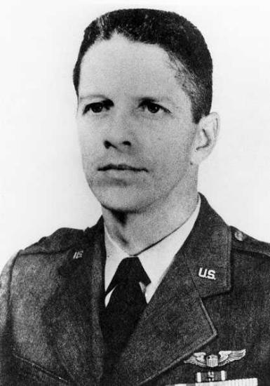 A photographic portrait of a man dressed in Air Force garb.