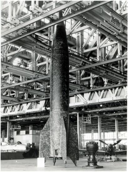 Large rocket in an empty facility.