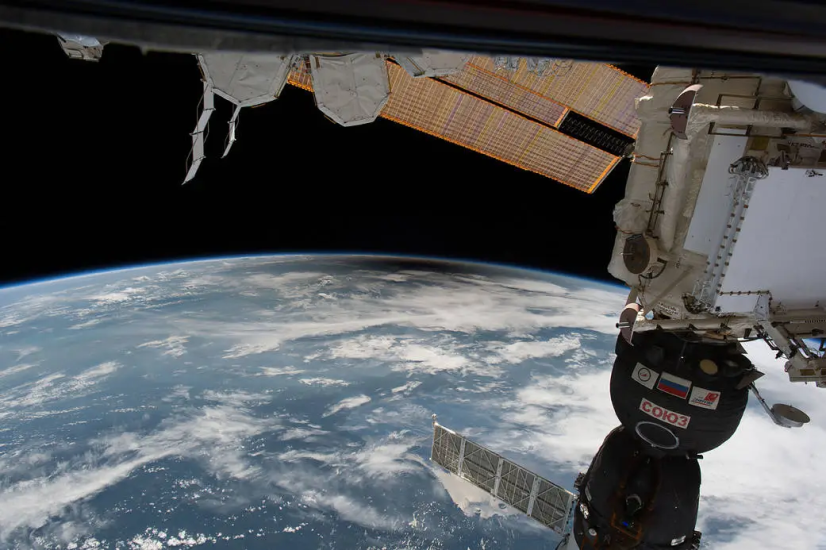 A shadow is evident on the Earth viewing the eclipse from space. 