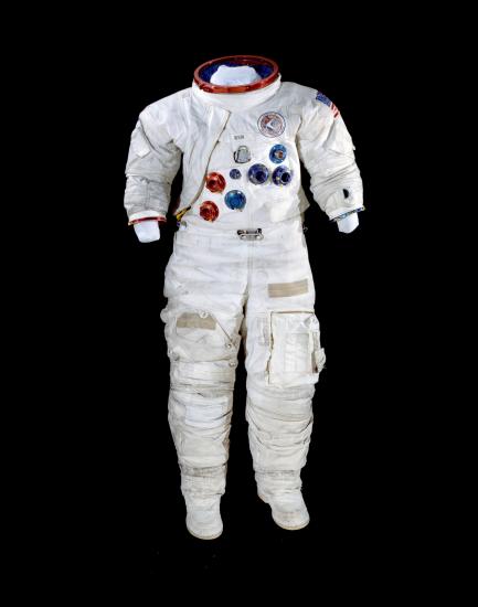 White spacesuit with blue and red ports on the front of it.