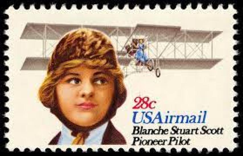 A postage stamp showing an illustration of a woman in an aviator's cap. Behind her is a biplane in flight. 