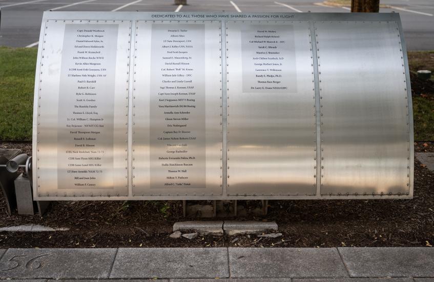 Silver metal plaque listing Wall of Honor Honorees.