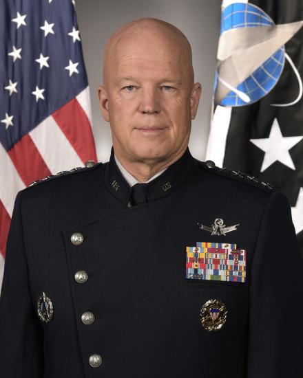 A man in military uniform poses for a portrait.