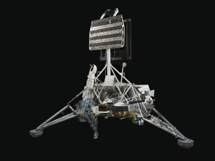 Engineering model with three-legged frame and mixed metals in landing position