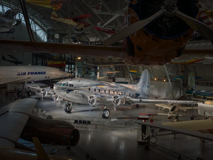 Silver painted commercial airplane displayed at the museum. 